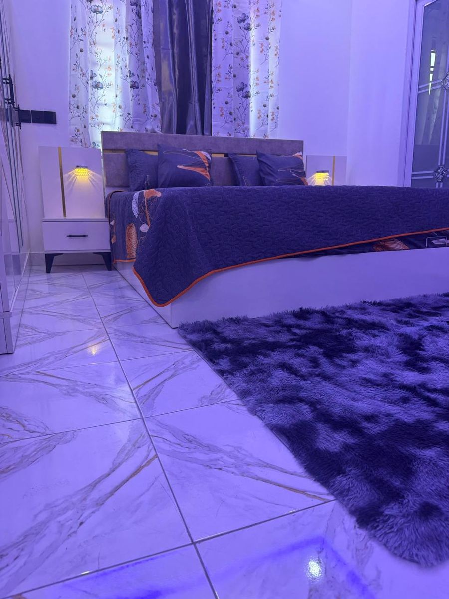 Bed with warm bedside lights